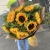Букет 9 подсолнухов в крафте в Ногинске Букет 9 подсолнухов в крафте в Ногинске