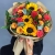 Букет "Ричи" из подсолнухов, альстромерий, гиперикума, роз, скиммии и диантусов в Ногинске