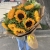 Букет 9 подсолнухов в крафте в Ногинске Букет 9 подсолнухов в крафте в Ногинске