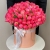 Композиция в шляпной коробке из 113 пионов Корал Шарм в Ногинске